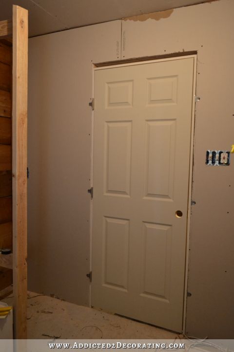 Moving & Reframing My Bathroom Door (Plus, My Door Design Decision)